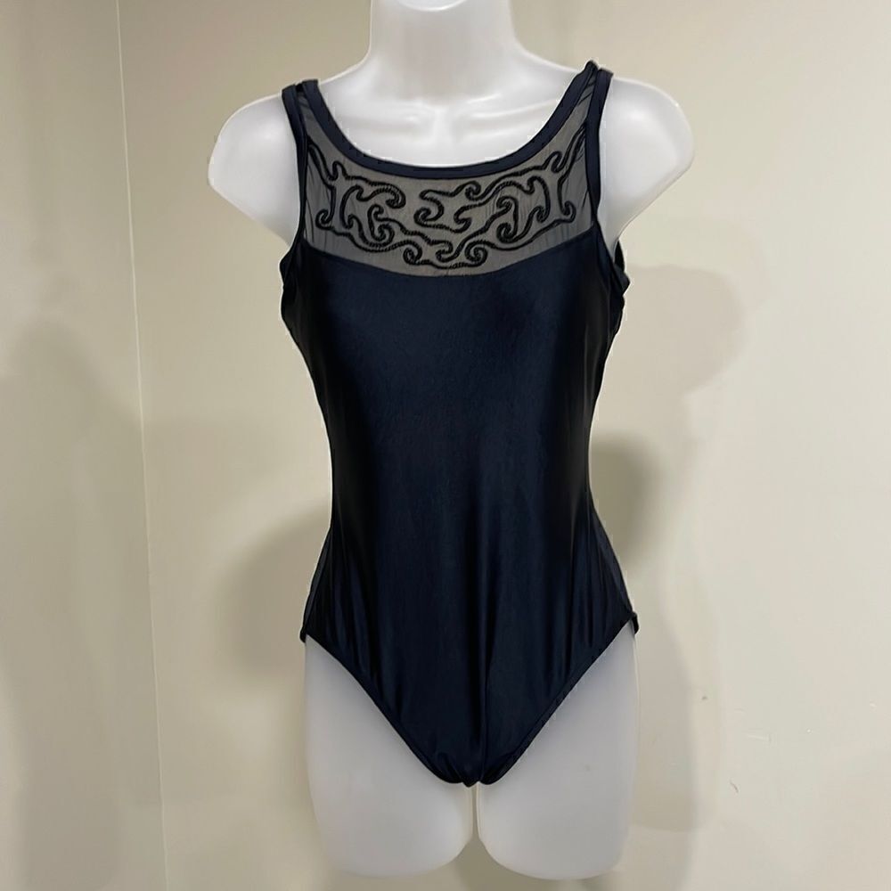 Jantzen black one piece swim suit.  Size 12 L large